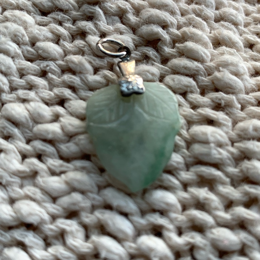 Jade acorn pendant on silver clasp